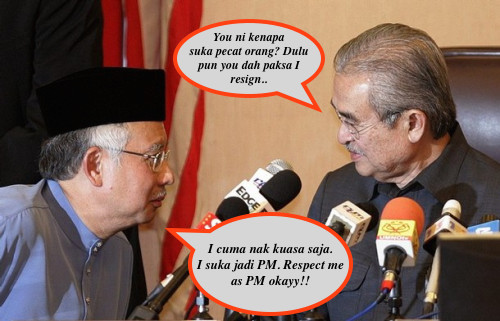 Malaysian PM Abdullah speaks to his deputy Najib after the UMNO party meeting in Kuala Lumpur